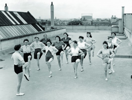 <p>An exercise class on the roof of the Pioneer Health Centre</p>
