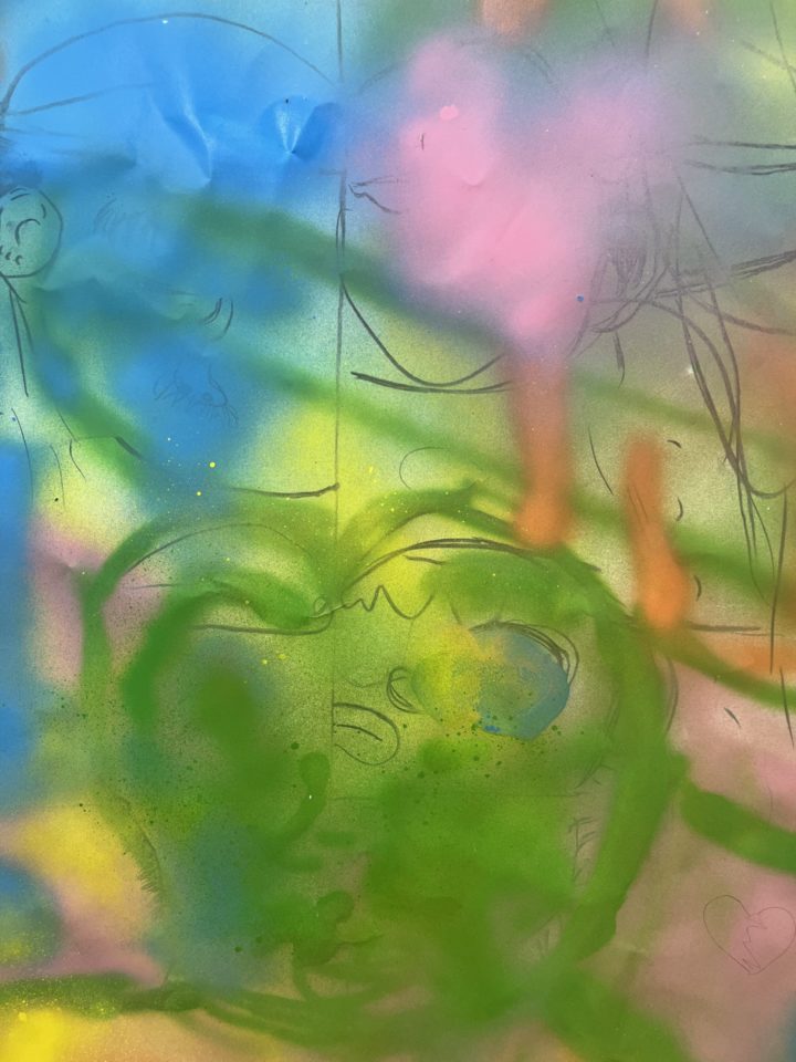 A blue and green and pink sprayed abstract painting.