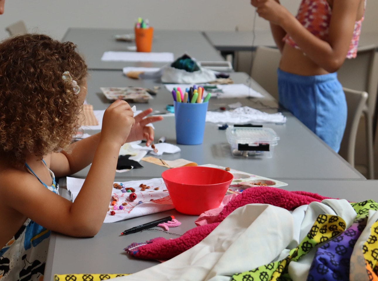 A child takes part in creative activities using textiles at the South London Gallery.